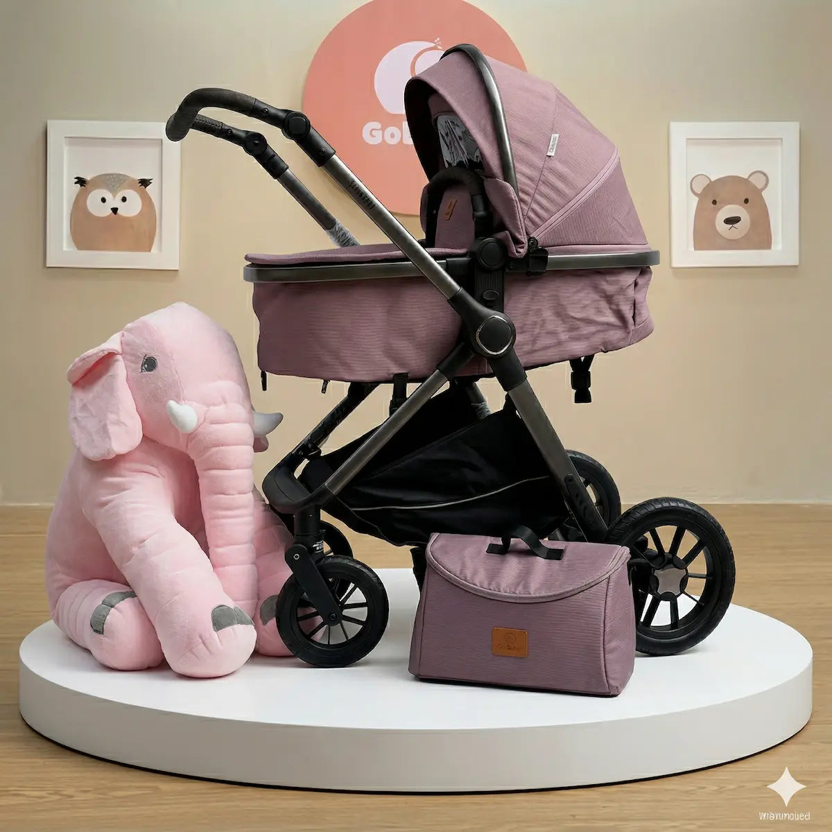 Combo Izzy Maxibaby: Coche Moisés de Lujo, Pañalera Funcional y Peluche Elefante Gigante