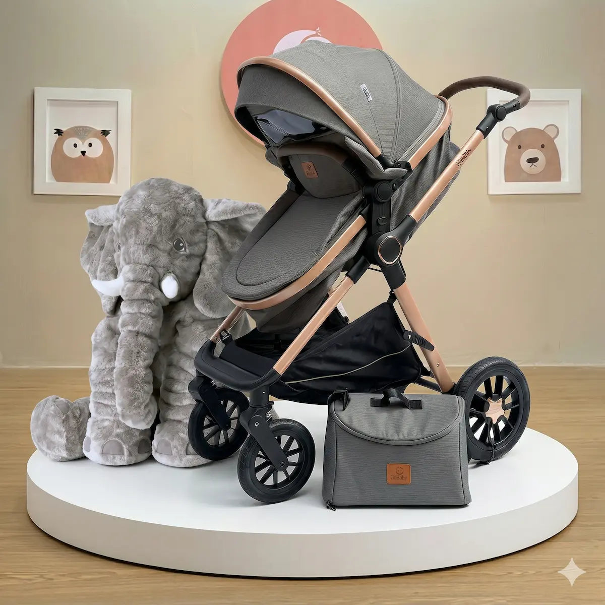 Combo Izzy Maxibaby: Coche Moisés de Lujo, Pañalera Funcional y Peluche Elefante Gigante
